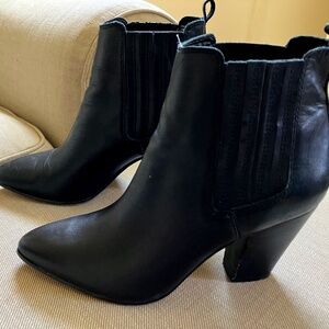 Women's black leather pointy toed slip-on shoe boots by ALDO size7. 3 inch heel